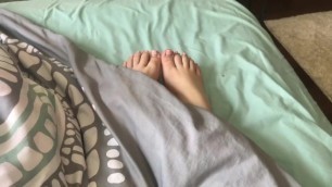 Girlfriend Stretching Sleepy Feet in the Morning
