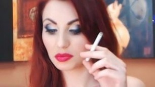 Redhead teasing and smoking